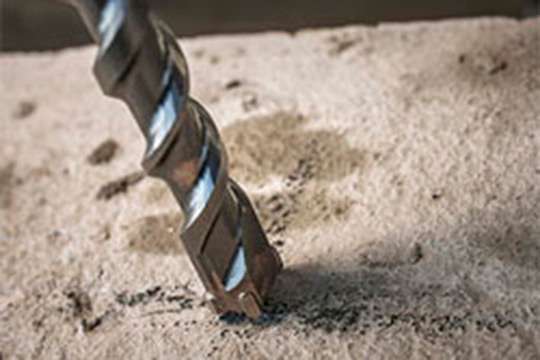 Сверление отверстий в бетоне: виды бурений и инструменты